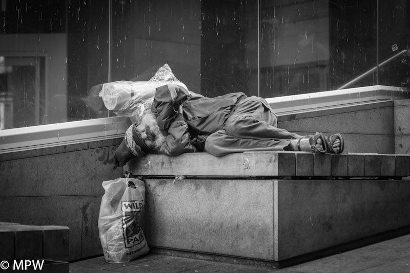 black and white street people queen street auckland