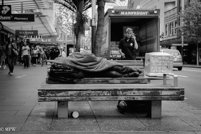mike wheelton the  largest collection of colour, black and white street photography, in Queen Street, Auckland city, New Zealand.