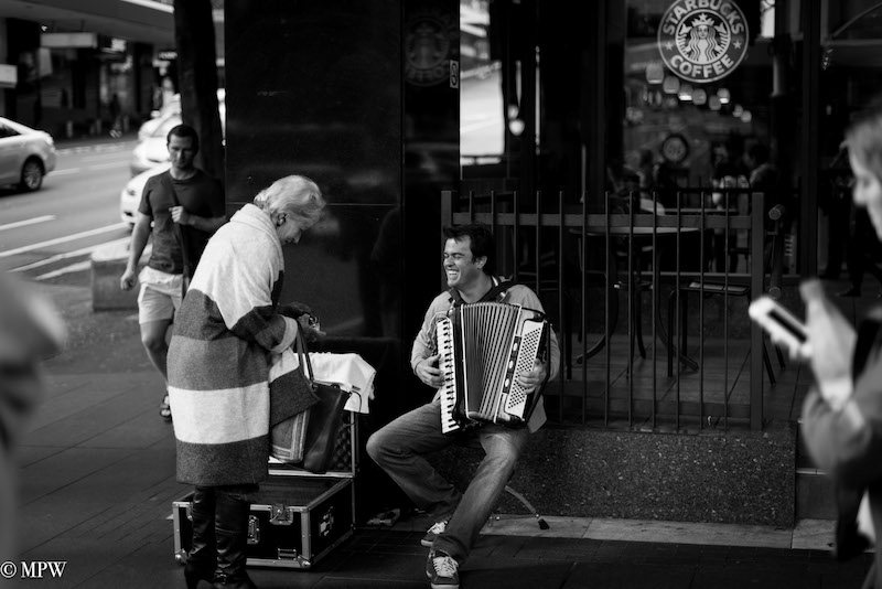 Mike Wheelton photo storyteller. The largest collection of colour, black and white street photography. Taken in and around Queen Street, Auckland city, New Zealand.