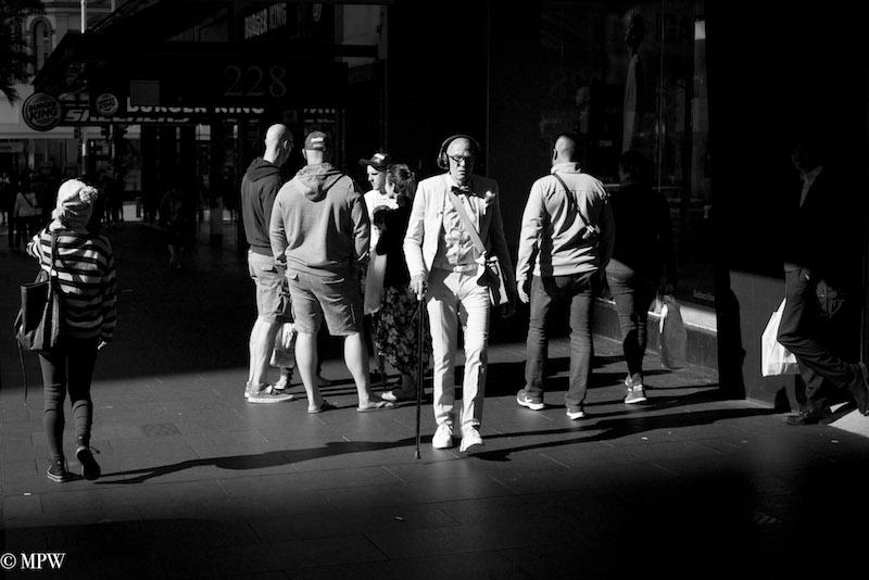 Mike Wheelton photo storyteller. The largest collection of colour, black and white street photography. Taken in and around Queen Street, Auckland city, New Zealand.