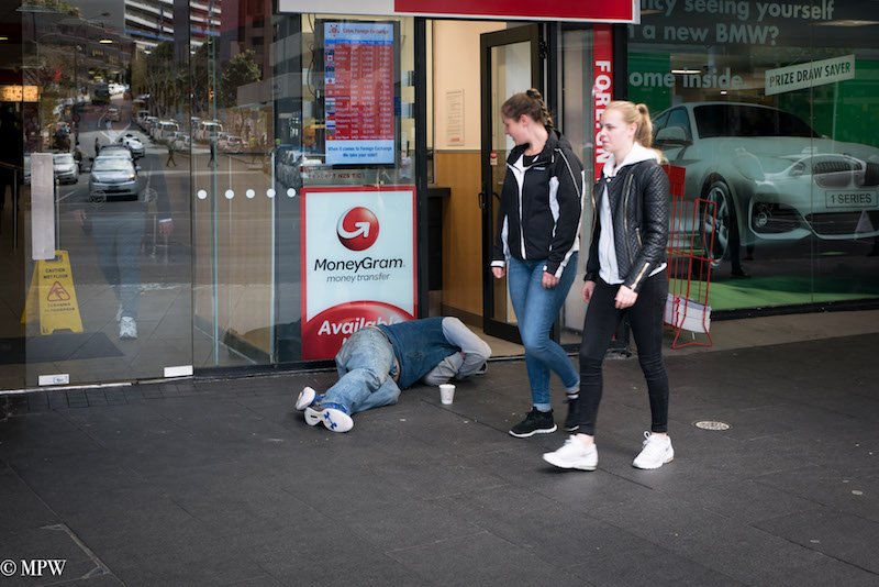 Mike Wheelton photo storyteller. The largest collection of colour, black and white street photography. Taken in and around Queen Street, Auckland city, New Zealand.