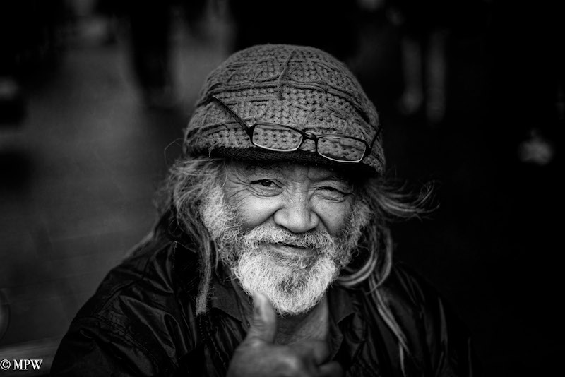 Mike Wheelton photo storyteller. The largest collection of colour, black and white street photography. Taken in and around Queen Street, Auckland city, New Zealand.