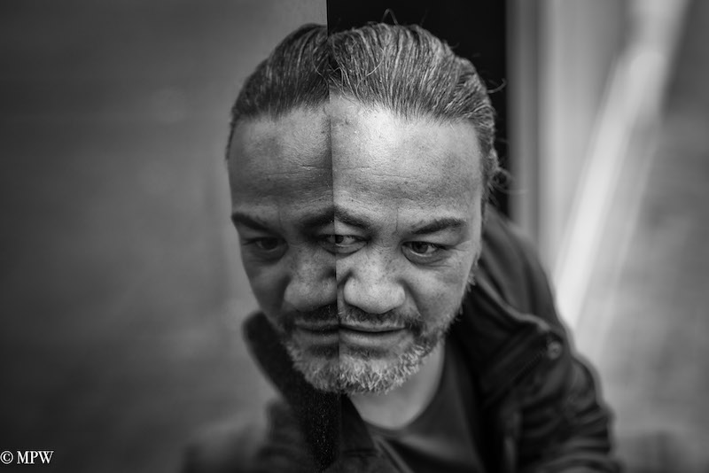 Mike Wheelton photo storyteller. The largest collection of colour, black and white street photography. Taken in and around Queen Street, Auckland city, New Zealand.