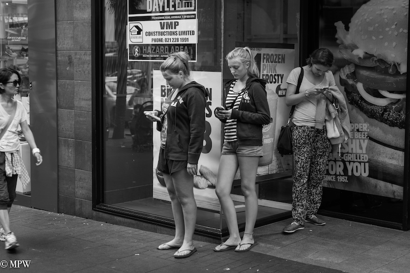 Mike Wheelton street photographer. Colour and black and white. Queen Street, Auckland city, New Zealand.