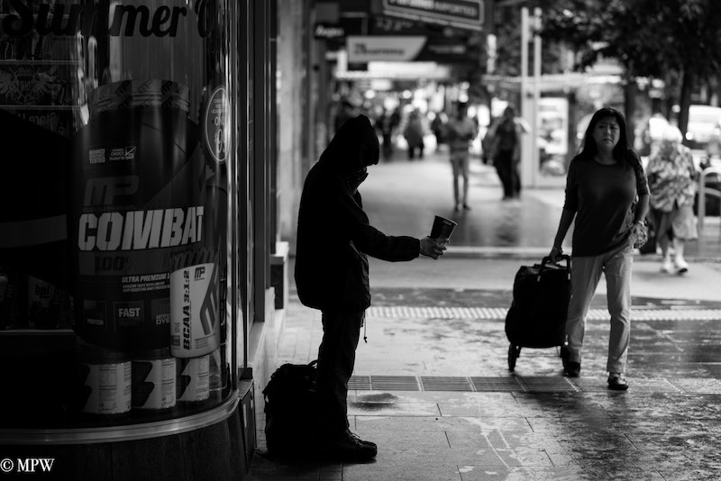 Mike Wheelton photo storyteller. The largest collection of colour, black and white street photography. Taken in and around Queen Street, Auckland city, New Zealand.