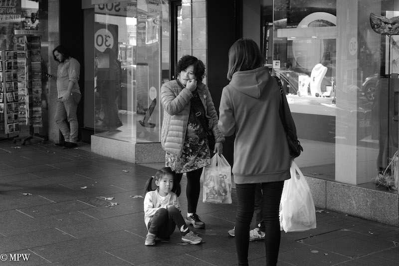 Mike Wheelton street photographer. The largest collection of colour, black and white street photography. Taken in and around Queen Street, Auckland city, New Zealand.
