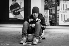 beggar on Queen Street, Auckland looking for a handout