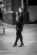 Asian women on her cellphone in pretty black stockings with long hair