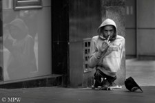 young beggar on Queen St Auckland