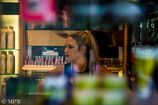 Through a shop window in Queen St Auckland City