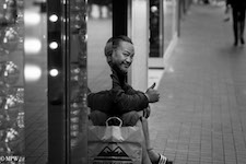 Mike Wheelton photo storyteller. The largest collection of colour, black and white street photography. Taken in and around Queen Street, Auckland city, New Zealand.